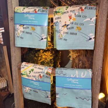 Colorful local greeting cards displayed in Ryser's retail shop